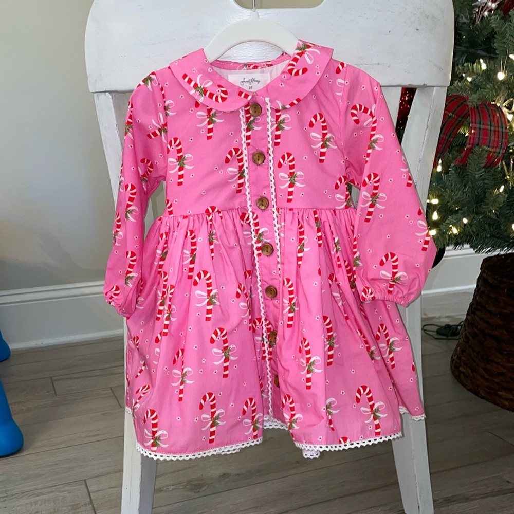 Great details in this sweet little dress.